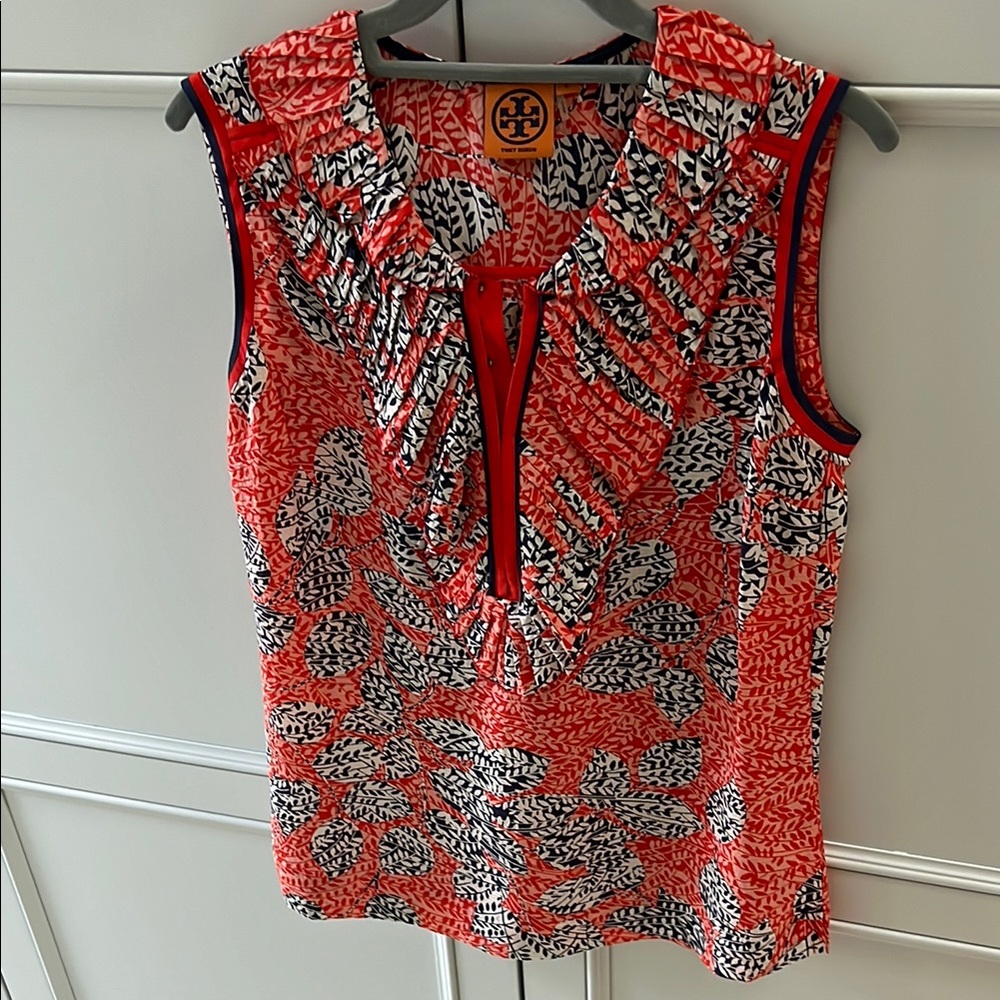 Tory Burch orange and  navy Sleeveless ruffled Blouse. Beautiful silk